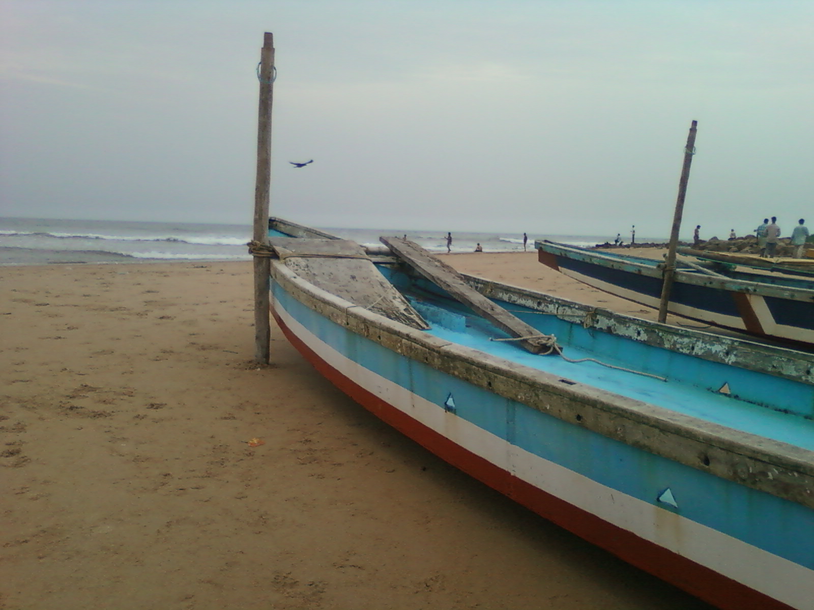 Painted fishing boats at Bheemili beach, Visakhapatnam
